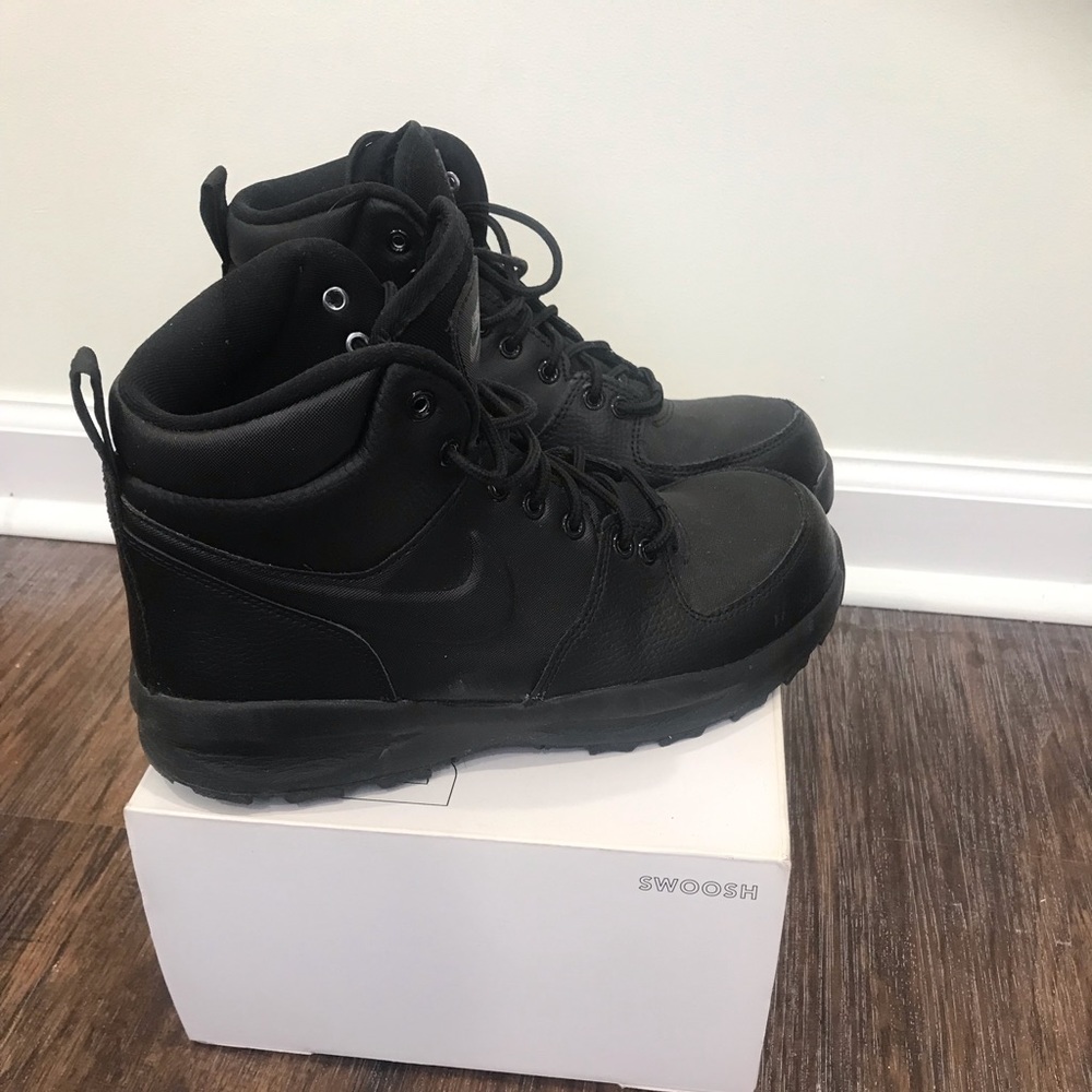 All black Nike boots